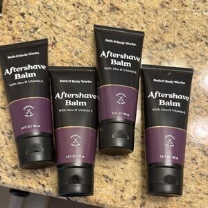 4 brand new Bath & Body Works Aftershave Balm - Black and Purple